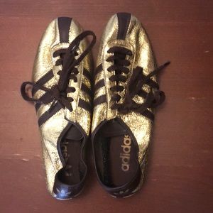 Gold foil adidas okapi sneakers